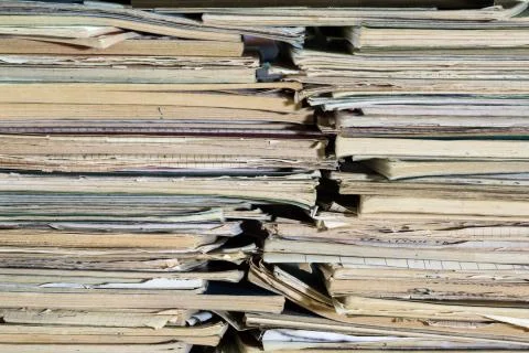 A stack of old school notebooks. Multicolored cover. Stock Photos