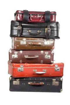 Stack of old suitcases isolated Stock Photos