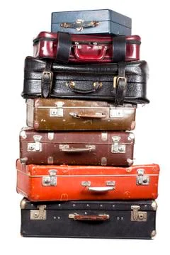 Stack of old suitcases isolated Stock Photos