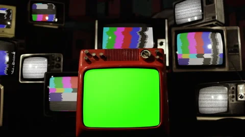 Stack of Old Television Sets with Color Bars and One TV Green Screen. Zoom In. Stock Footage 140882520