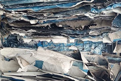 Stack of old torn blue paper closeup for paper vintage background Stock Photos