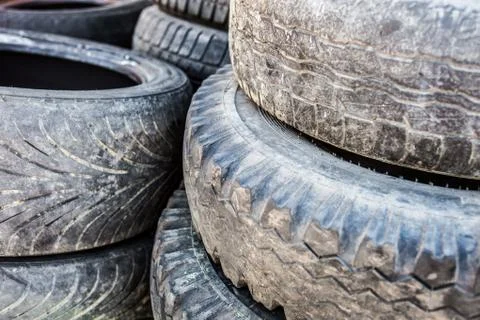 Stack of the old used tire covers. Stock Photos