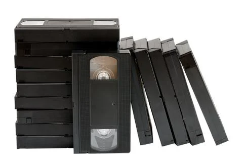 Stack of old VHS video cassettes isolated on white background Stock Photos
