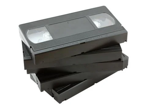 Stack of old VHS video cassettes isolated on white background Stock Photos