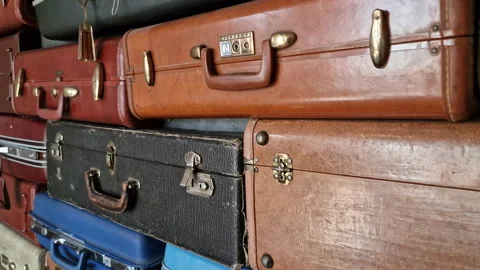 Stack of Old Vintage Suitcases, Close Up Stock Footage 339713289