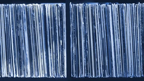 Stack of old vinyl records. Blue tone Stock Footage 89195598