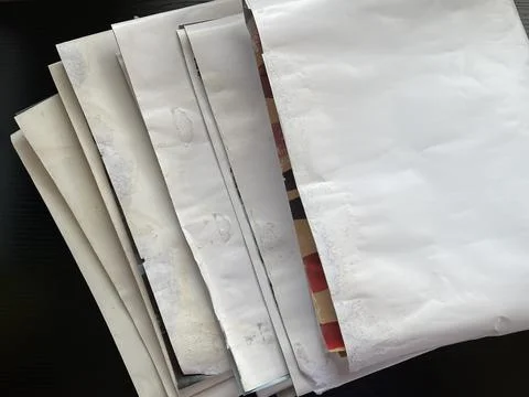Stack Of Old Water-Damaged Posters With Ripped Edges Foto stock