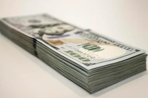 Stack of one hundred dollar banknotes close up view Stock Photos
