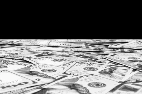 Stack of one hundred dollar bills isolated on black background. Stack of ca.. Stock Photos