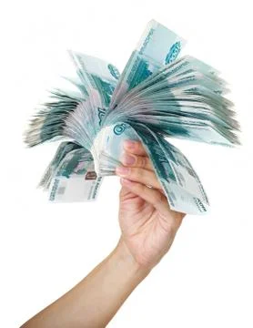 Stack of one thousandth bills in the female hand. 스톡 사진
