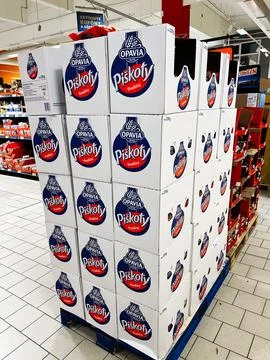 Stack of Opavia Pikoty Tradici cookie boxes on a pallet in a supermarket di.. 스톡 사진