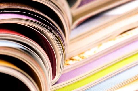 Stack of open magazines Stock Photos