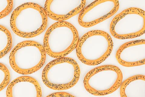 A stack of orange wristbands with white dots, symbolizing unity or team spi.. Stock Photos