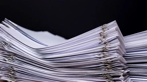 Stack overload document report paper with paperclip 스톡 동영상 137186903
