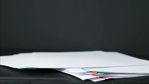 Stack overload document report paper with colorful paperclip  Stock Footage 137522240