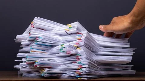 Stack overload document report papers, business paperless concept. Stock Photos