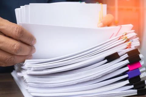 Stack overload document report papers, business paperless concept. Stock Photos