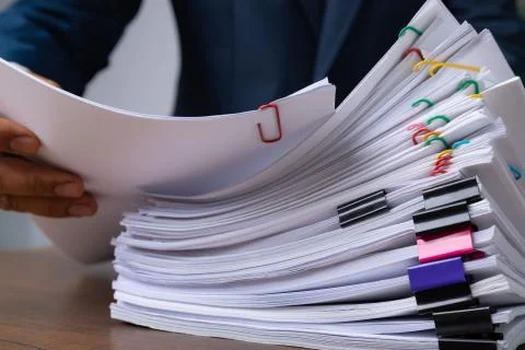 Stack overload document report papers, business paperless concept. Stock Photos