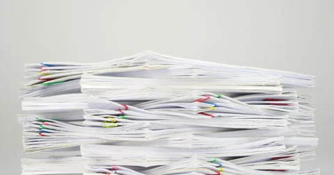 Stack overload document on white table time lapse 스톡 동영상 61557506