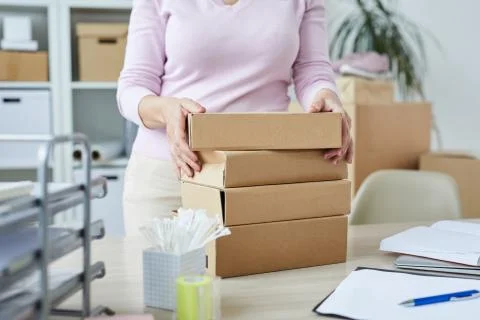 Stack of packed boxes with orders of online shop clients Stockfoto's