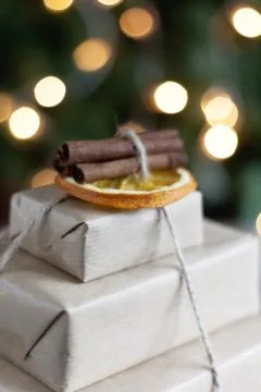 Stack of packed gifts on the background of Christmas lights effect instagram Foto stock