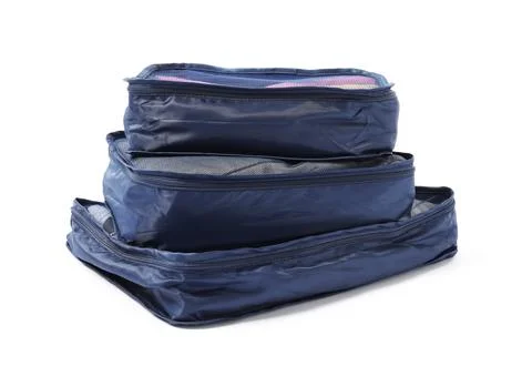 Stack of packing cubes isolated on white Stockfoto's