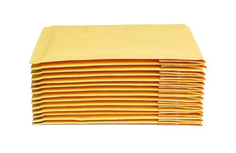 Stack of Padded Mailers Isolated on White Stockfoto's