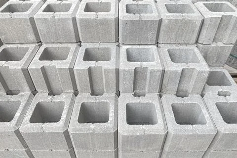 Stack on Pallet of Concrete Cinder Blocks, Grey Uniformed brick Shapes buil.. Stock Photos