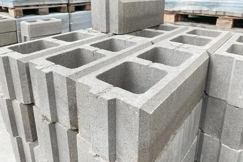 Stack on Pallet of Concrete Cinder Blocks, Grey Uniformed brick Shapes buil.. Stock Photos