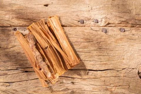 Stack of palo santo wood on the table (Bursera graveolens) Stock Photos