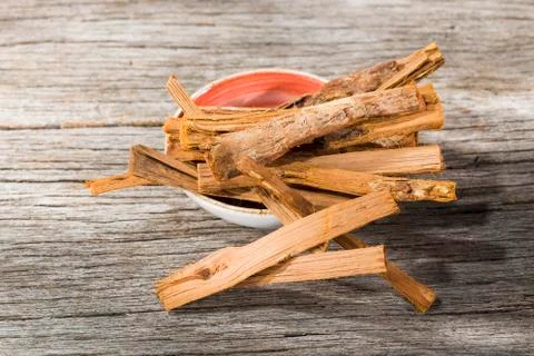 Stack of palo santo wood on the table (Bursera graveolens) Stock Photos