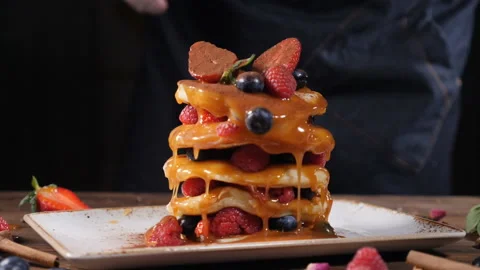 Stack of Pancake with Fresh Berry served in white plate decorated with 스톡 동영상 106657792