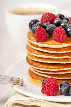 Stack of pancakes with berries breakfast Stock Photos