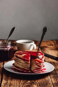 Stack of pancakes with berry fruit marmalade Stock Photos