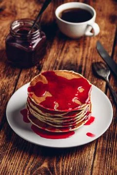 Stack of pancakes with berry fruit marmalade Stock Photos