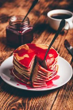 Stack of pancakes with berry fruit marmalade Stock Photos