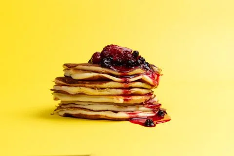 Stack of pancakes with berry jam Stock Photos