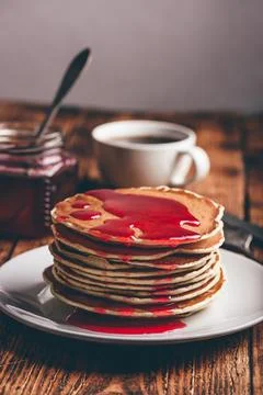 Stack of pancakes with berry jam Stock Photos