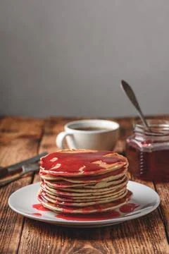 Stack of pancakes with berry jam Stock Photos