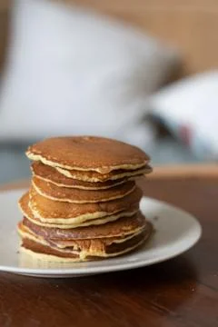Stack of pancakes on the ceramic white plate Stock Photos