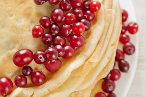Stack of pancakes with cranberries closeup Stock Photos