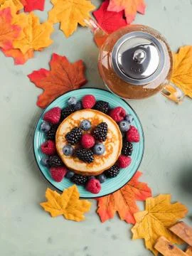 Stack of pancakes with fresh berries Stock Photos