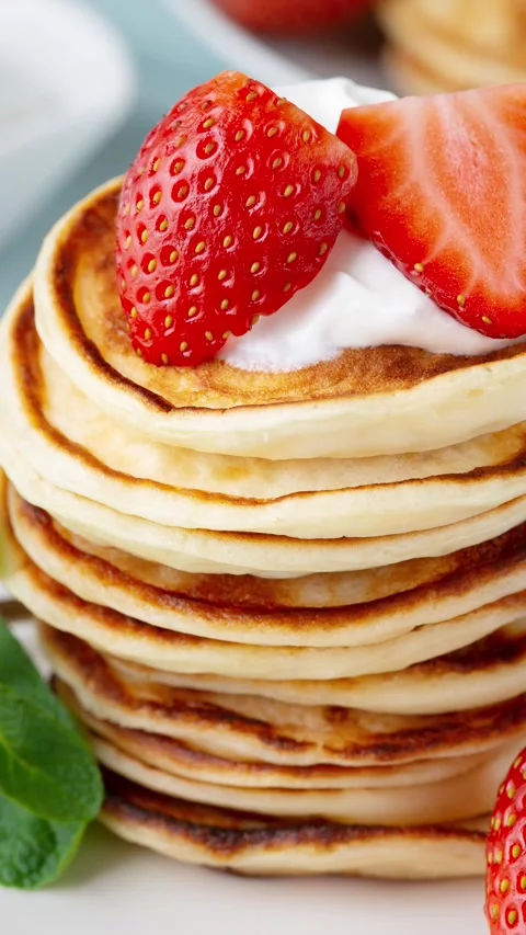 Stack of pancakes with fresh strawberry. Stock Footage 301471860