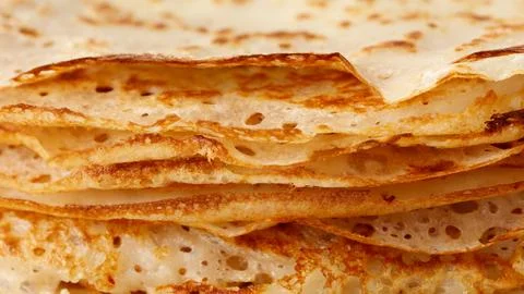 A stack of pancakes with a hole in the middle Stock Photos