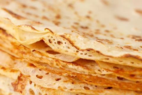 A stack of pancakes with holes in them Stock Photos