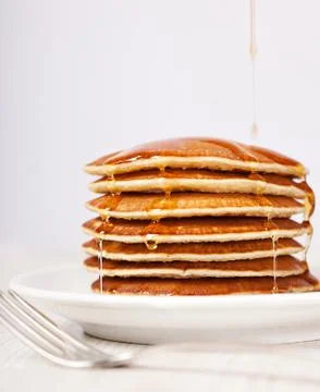 Stack of pancakes with maple syrup breakfast Stock Photos