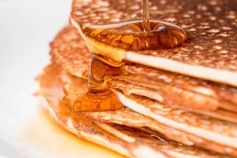 Stack of pancakes with maple syrup Stock Photos