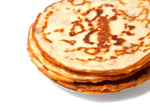 Stack of pancakes on a plate isolated over white Stock Photos