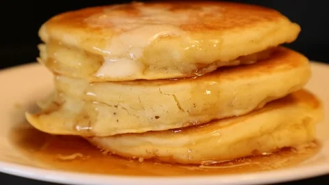 Stack of Pancakes on Plate Syrup Pouring on Top for Breakfast Stock Footage 127264839
