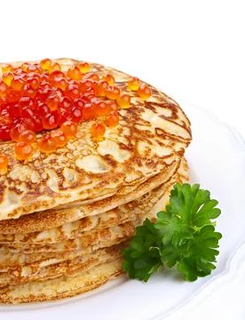 Stack of pancakes with salmon caviar Stock Photos